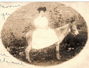 c1910 LADY ON DONKEY INVITING HOP ON HERE WITH ME PHOTO RPPC POSTCARD P1328