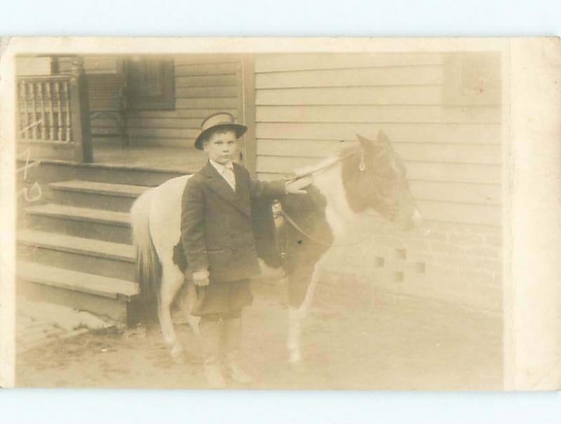 rppc Pre-1920's BOY STANDING BESIDE LITTLE PONY HORSE AC7967