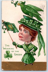 1911 St. Patrick's Day Woman Wearing Green With Hat Bird Pipe Flag Postcard