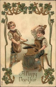 New Year Little Boy Blacksmiths Anvil Hammers Anchors GILT EMBOSSED Postcard