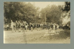 Freeman SOUTH DAKOTA RPPC '10 FIREMEN RACE Fire Department LADDER WAGON Fireman