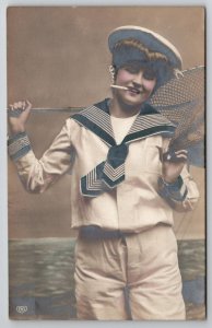 RPPC Lovely Lady Sailor Smoking Fishing Net Studio Seascape Tinted Postcard L36