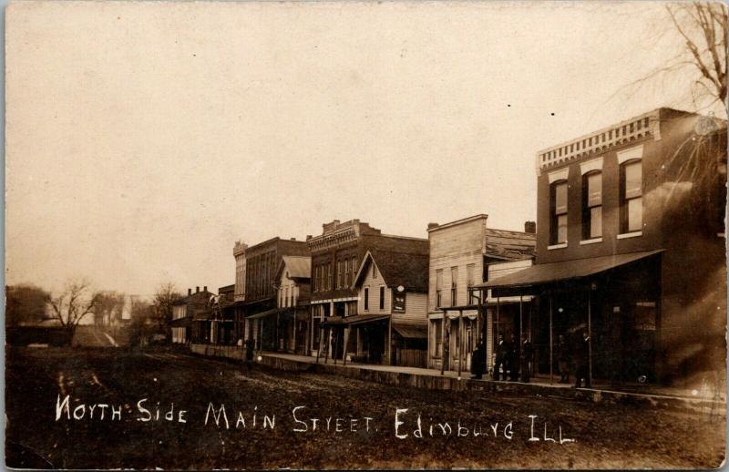 Edinburg Illinois~North Side Main Street~5 Men @ Farm Implements Store~1908 RPPC