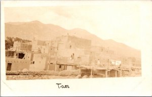 Real Photo Postcard Adobe Buildings Scene in Taos, New Mexico