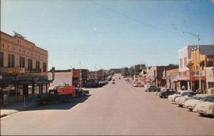 Gillette WY Street Scene Cars Stores Postcard