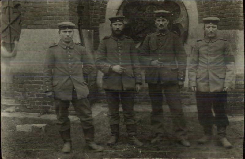 WWI German Soldiers Posing Uniforms Hats Used 1915 Real Photo Postcard