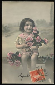 Early French tinted real photo postcard. Little girl holding roses