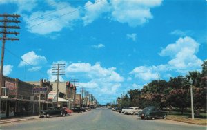 Luling TX Main Street Storefronts  Old Cars Crepe Myrtle & Palm Trees Postcard