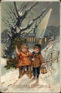 Christmas Little Boy and Girl Haul Christmas Tree at Night c1910 Postcard