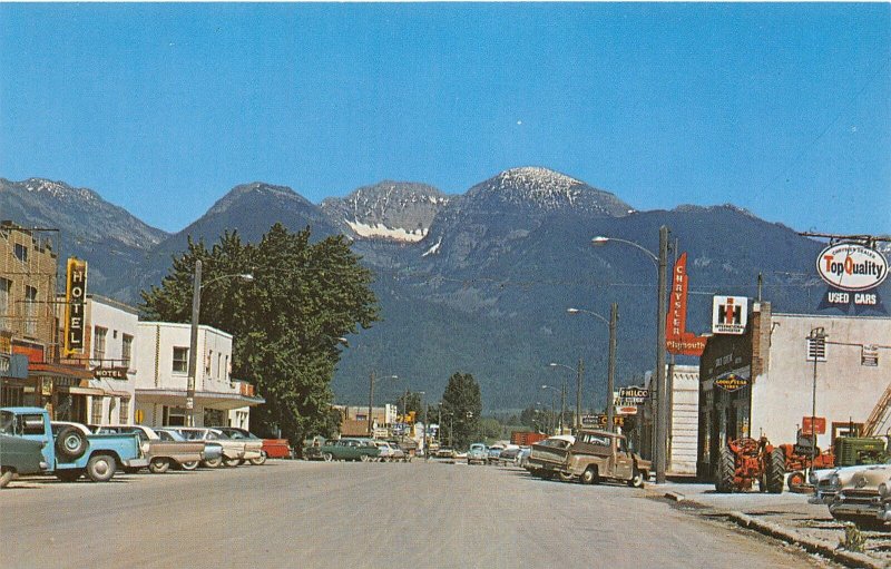 F80/ Ronan Montana Postcard Main Street Stores Autos 