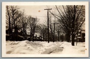 Postcard RPPC c1915 Batavia NY Winter Street View Possibly Main St.