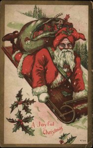 Christmas Santa Claus Sled Toys Holly c1900s-10s Postcard