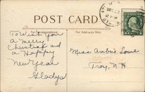 Christmas Little Boy Pulls Girl on Sled Bobsled Embossed Border Vintage Postcard