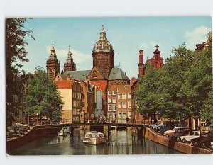 Postcard St. Nicholas Church overlooking Oudezijds Kolk, Amsterdam, Netherlands