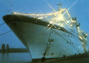 VINTAGE CONTINENTAL SIZE POSTCARD NIGHT VIEW OF THE ARKONA SHIP ROSTOCK GERMANY