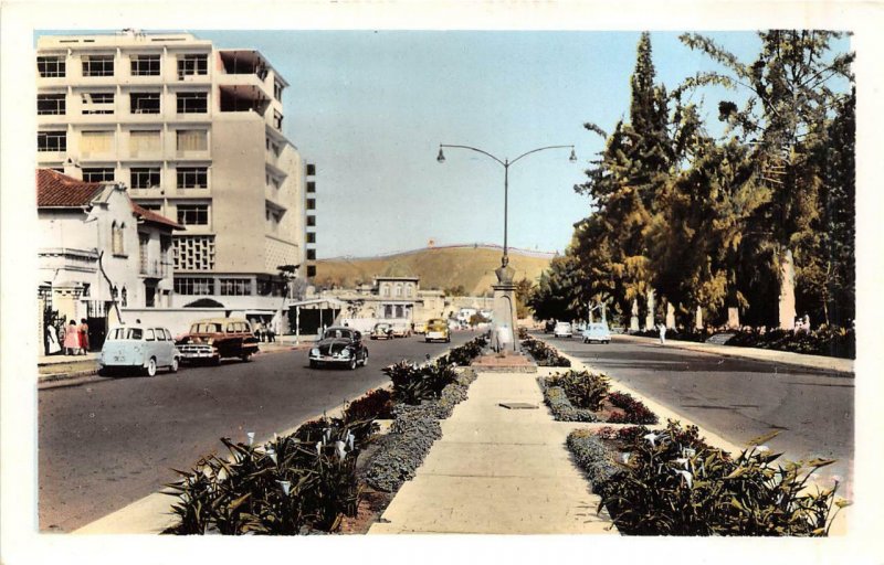 RPPC ECUADOR CARS STREET VIEW COLORIZED REAL PHOTO POSTCARD (c. 1930s)