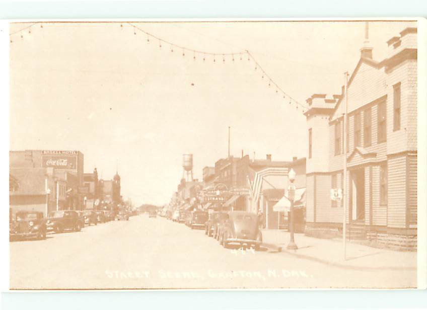 RPPC ? Grafton North Dakota Street Scenes Coca Cola Gas Lights Postcard