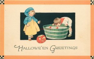 Halloween, Little Boy and Girl, Dunking for Apples, JOL, Gibson Art