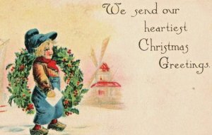 c.1910 Christmas Greeting Postcard Wreath Dutch Child Windmill Pink Perfection