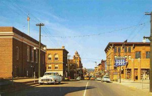 Sheldon Avenue Copper Motor Used Cars Sign Houghton Michigan 1955c postcard