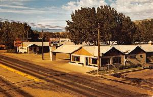 Cody Wyoming Sunrise Motor Inn Street View Vintage Postcard K66129