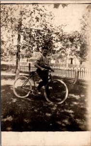 Real Photo Postcard Man on a Bicycle