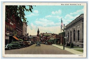 c1950's Main Street Classic Cars Buildings Flags Rochester NH Posted Postcard