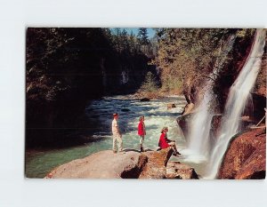 Postcard Picturesque waterfall on the turbulent Green River, Washington