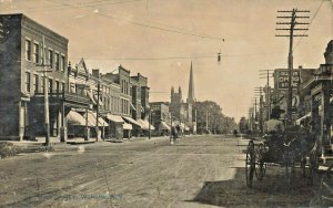 Warsaw NY Storefronts Horse & Wagons Dirt Street Real Photo Postcard