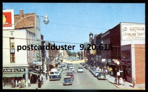 618 - BARRIE Ontario Postcard 1960s Main Street. Drugstore. Classic Cars