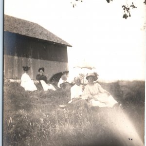 c1910s Cute Old Man & Woman in Grass RPPC Mini Sun Umbrella Photo Picnic A156