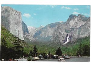 Yosemite National Park CA Wawona Tunnel Visitors with 1950s Cars