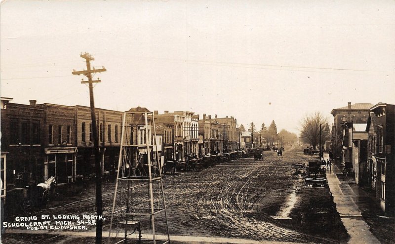 H9/ Schoolcraft Michigan RPPC Postcard c1910 Grand St North Stores Tower