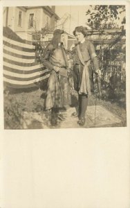 RPPC Postcard 2 People in Costume Boy in Dress/ Drag Stand Near American US Flag