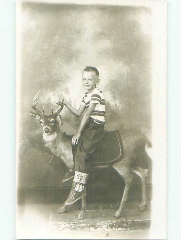 rppc c1910 BOY RIDING ON STUFFED DEER AT STUDIO AC8673