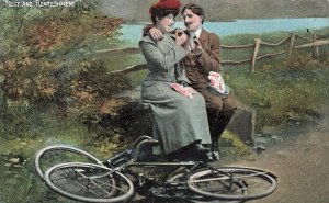REST & REFRESTMENT-MAN & WOMAN RIDING BICYCLES~BRITISH ROMANCE POSTCARD