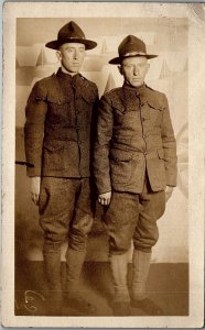 c1918 US ARMY SOLDIERS CAMP AS BACKGROUND REAL PHOTO RPPC POSTCARD 34-103