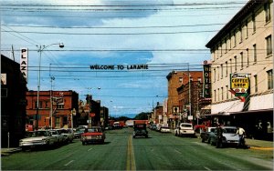 Vtg Laramie Wyoming WY Street View Old Cars Schlitz Beer Sign Postcard