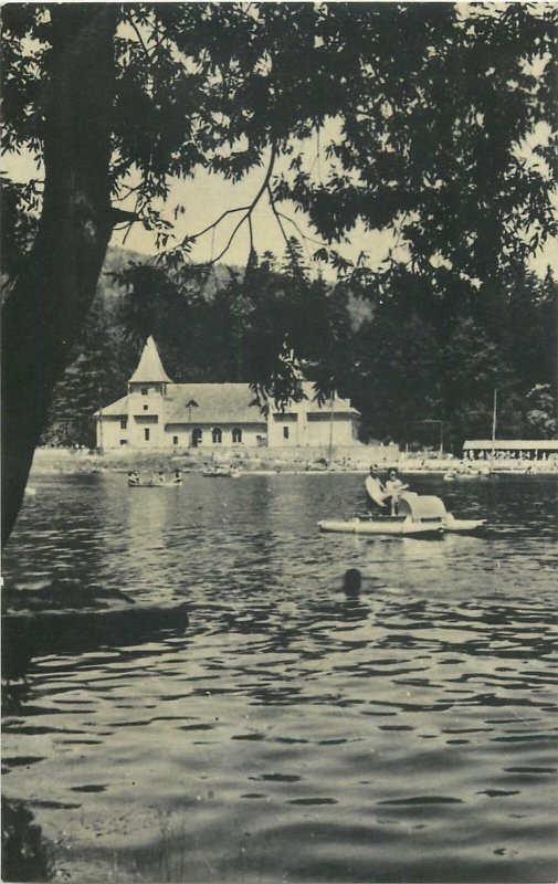 Romania Postcard Ciucas Lake Tusnad peddling boat