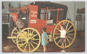 State View~Red Concord Express Stagecoach In Montana~Vintage Postcard