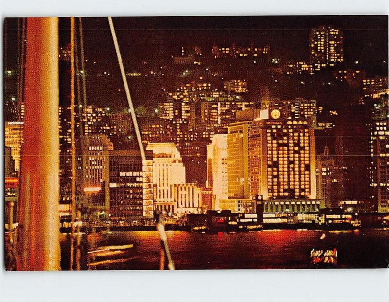 Postcard Night view of The Mandarin from a harbour ferry, Hong Kong, China