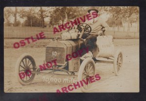 Giddings TEXAS RPPC c1915 RFD MAIL CARRIER Mailman CAR 70,000 MILES! USPS TX