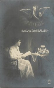 Woman in pray for peace 1917 Germany ww1