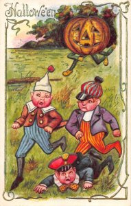 Halloween Greetings Boys running  from Pumpkin Jack o Lantern Postcard AA69290