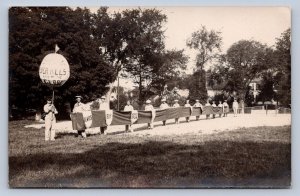 J93/ Interesting RPPC Postcard c1910 Globe Overalls Advertising Parade 320