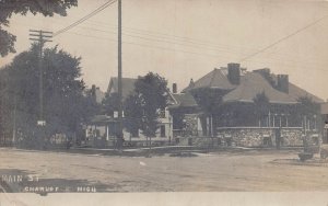 J77/ Charlotte Michigan RPPC Postcard c1910 Main Street Homes  422