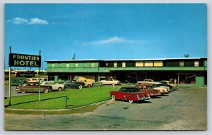 Roadside~McAllen Texas~Frontier Hotel~Parking Area~Sign~Cars~1950s Postcard