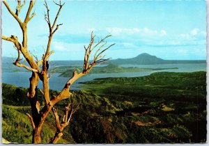 VINTAGE CONTINENTAL SIZE POSTCARD VIEW OF TAAL LAKE AND VOLCANO PHILIPPINES