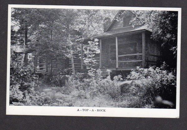 ME A Top A Rock Cabins Yorks Log Village Loon Lake Rangeley Maine Postcard PC