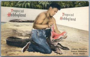 SEMINOLE INDIAN VILLAGE ALLIGATOR WRESTLER HENRY NELSON MIAMI FL VINTAGE PC